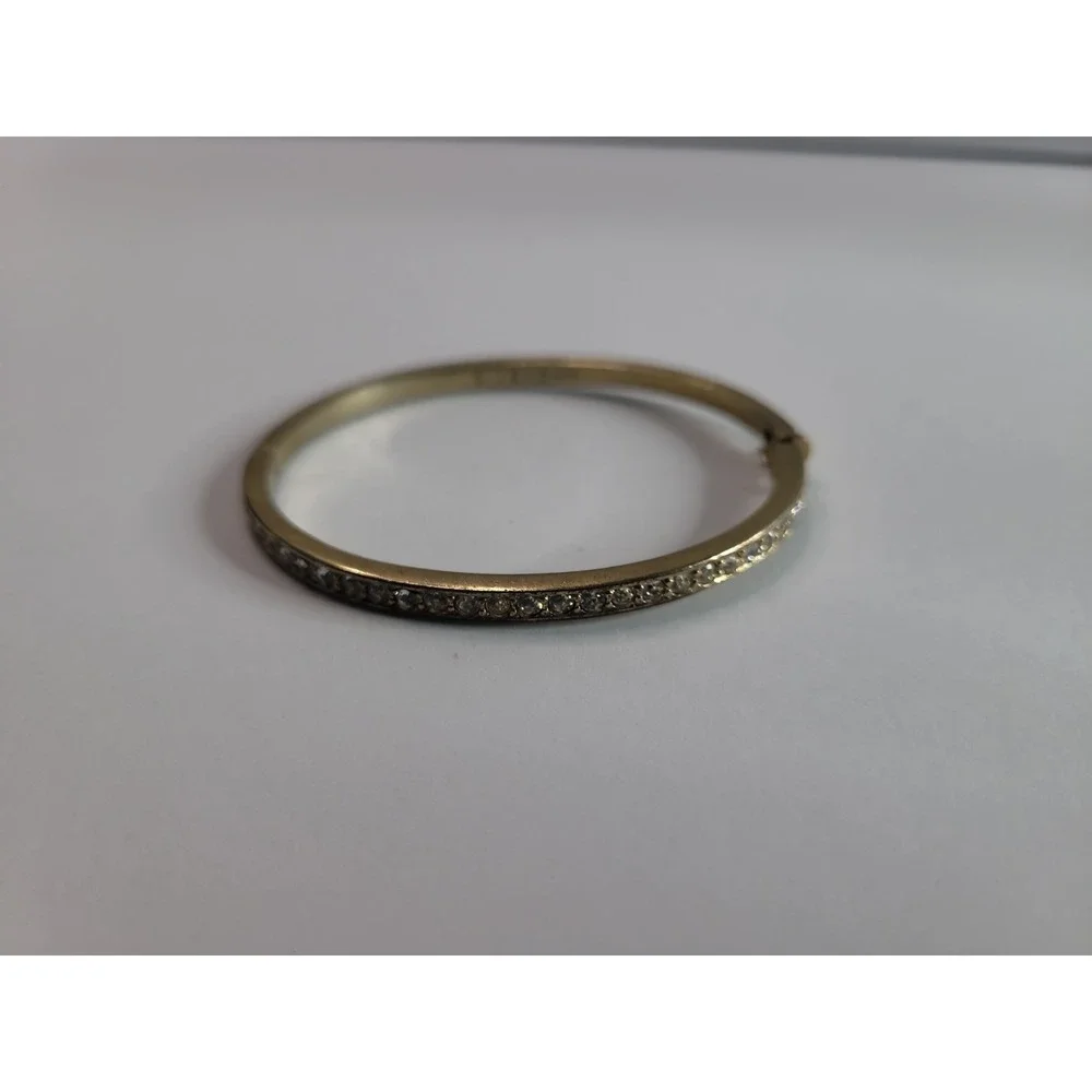 Vintage Givenchy Signed Gold Tone Clear Rhinestones Hinged Bangle Bracelet